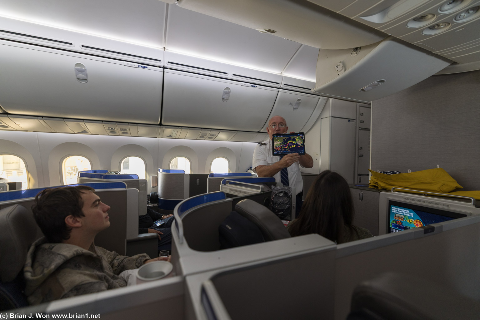 Captain Jim Denton always brings out his in-flight widgets and explains the flight plan to the front cabins.