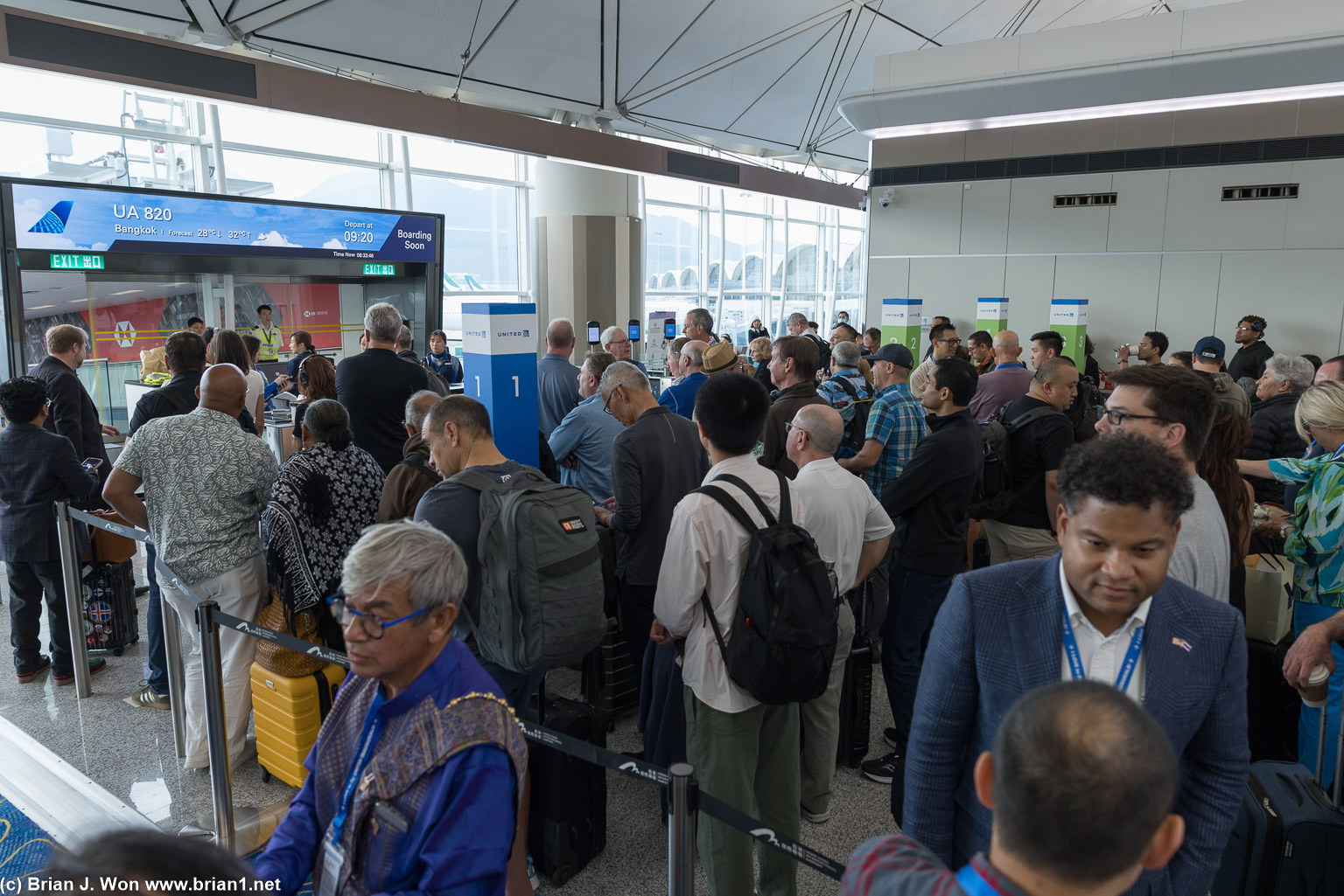 Big crowd waiting to board.
