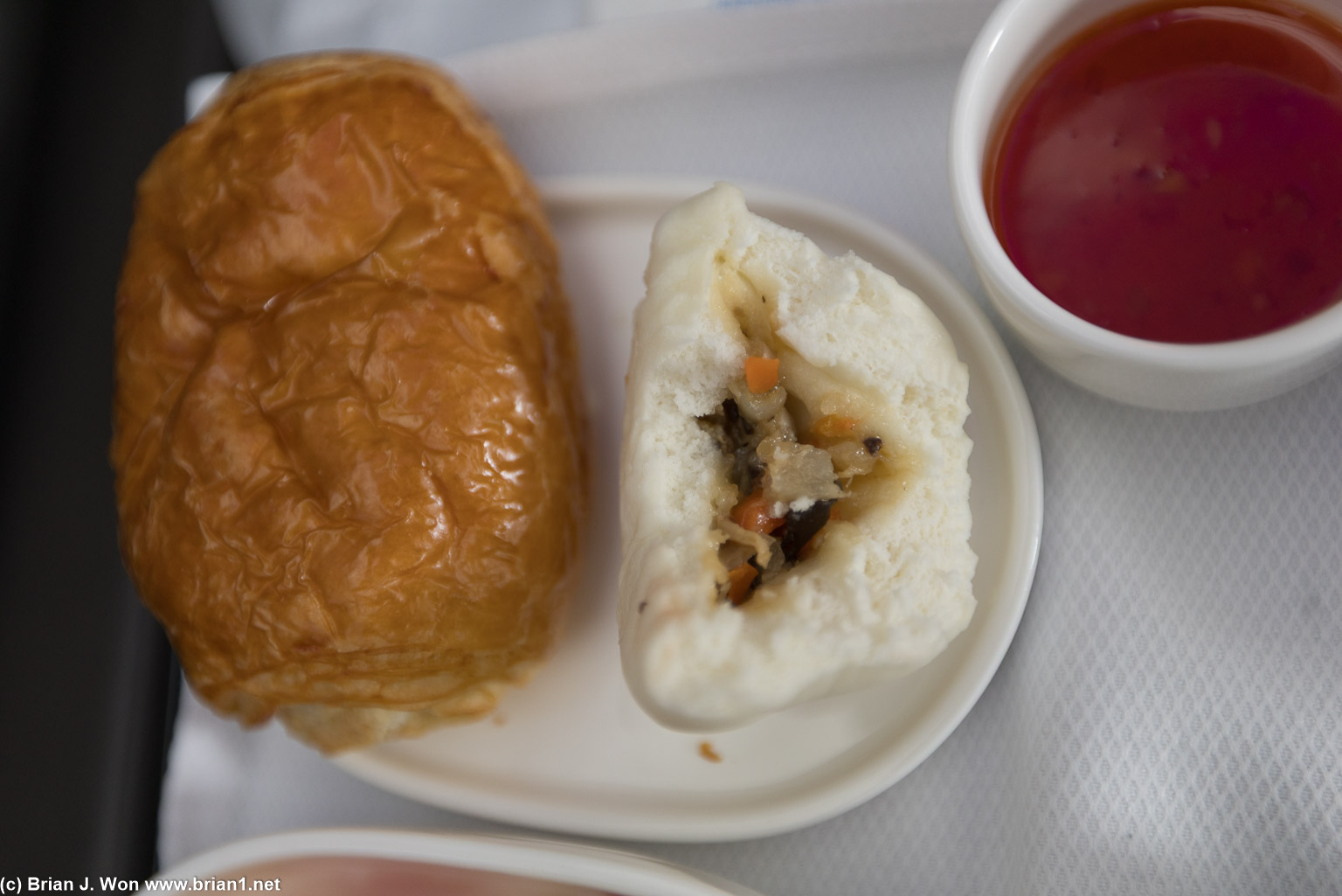 Chocolate "croissant" and steamed bun.