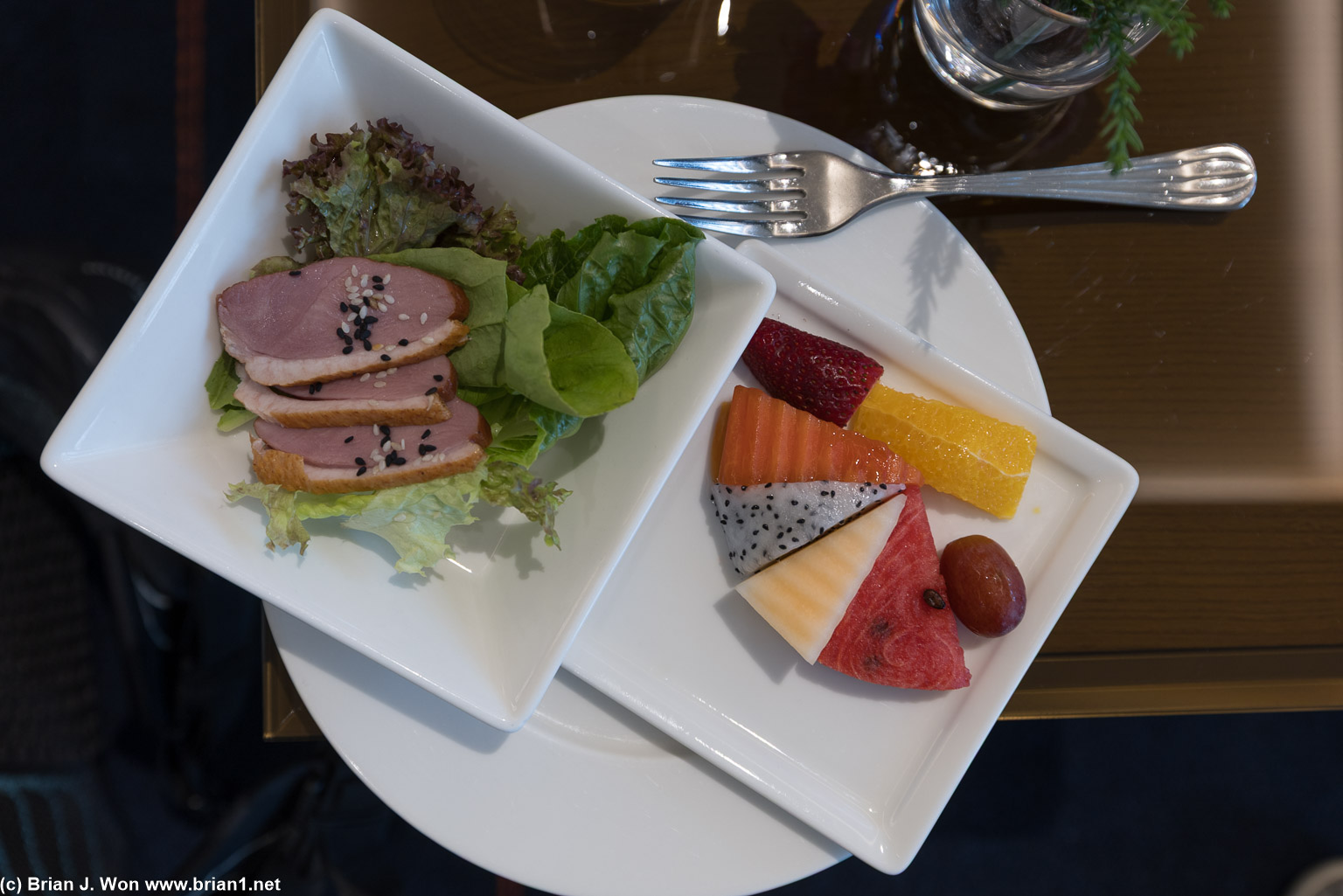 Smoked duck breast and fresh fruit.