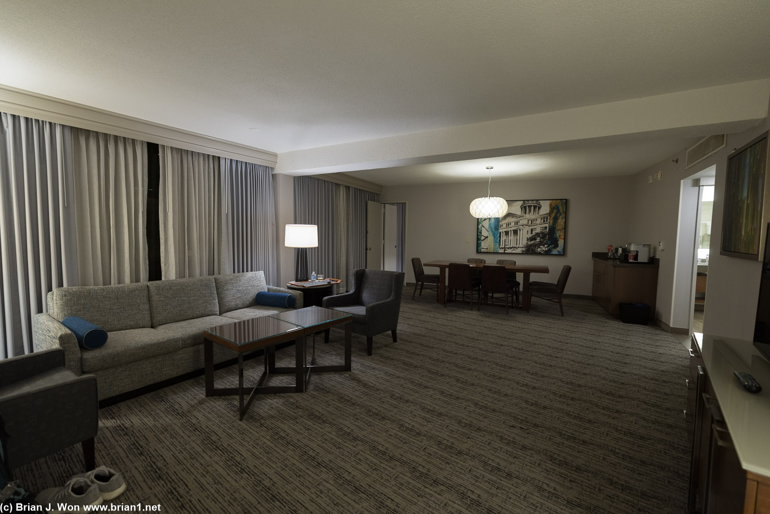 Living room is massive in this hotel room.