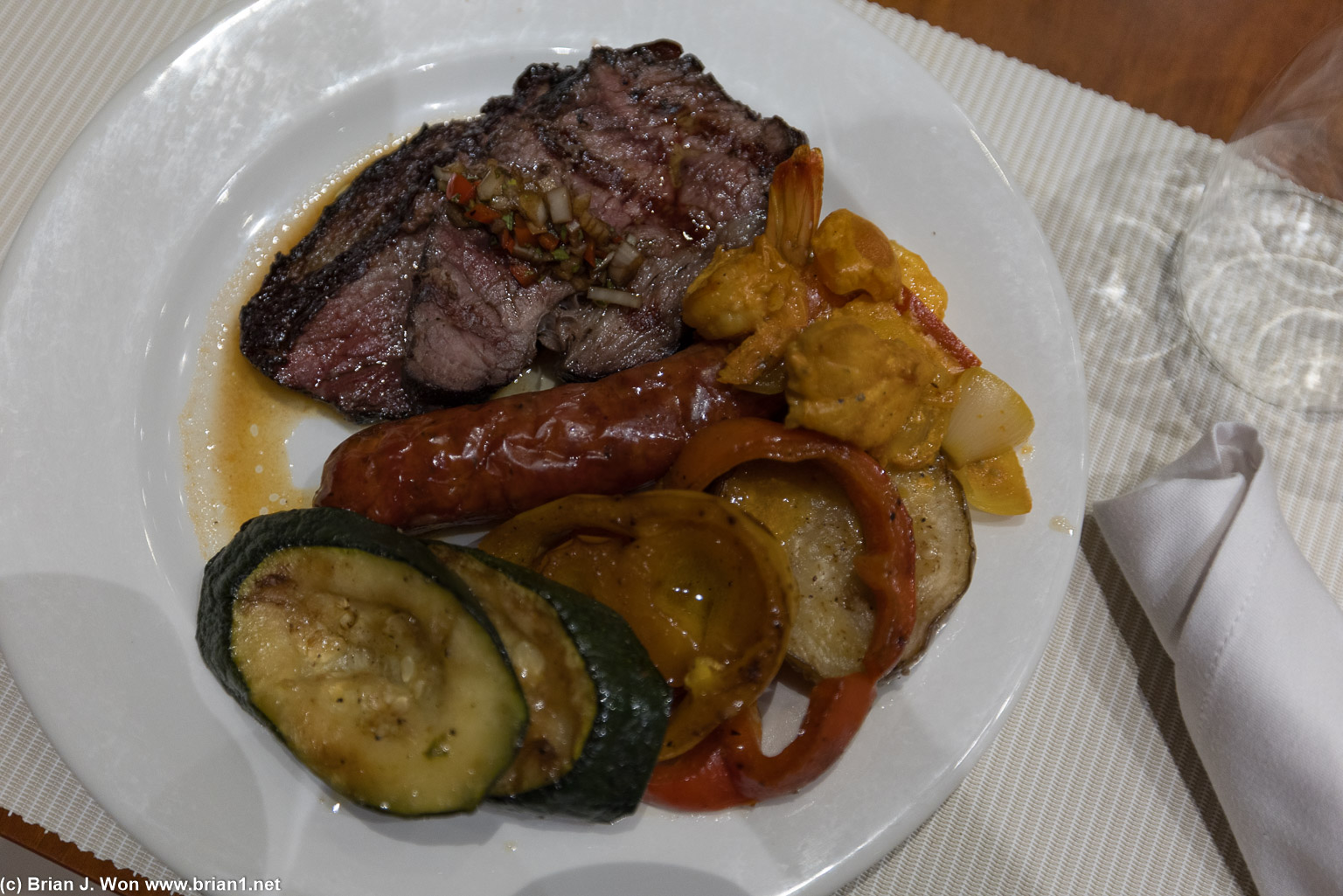 Beef, chorizo, grilled veggies, bit of (salty) paella.