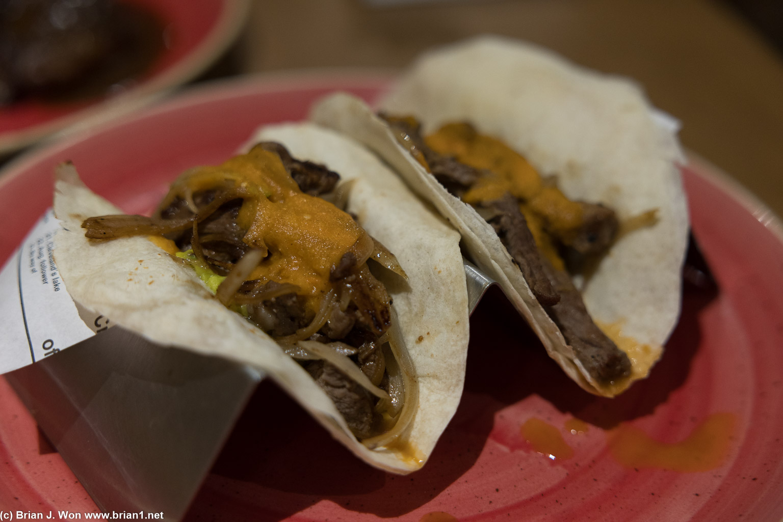 Flank steak taco close-up. Pretty plain.