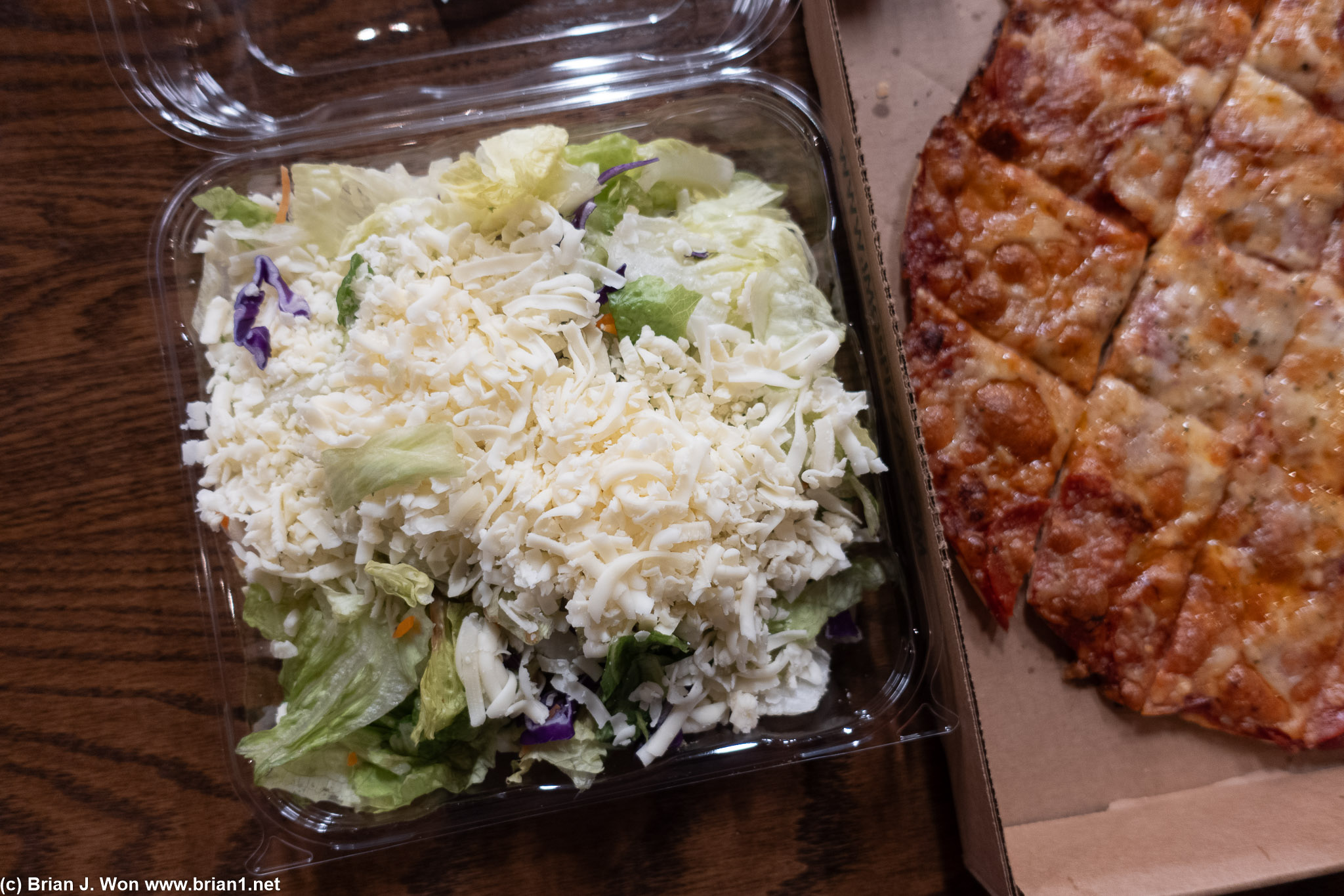 Did not expect the pile of lettuce to come with as much cheese as the pizza.