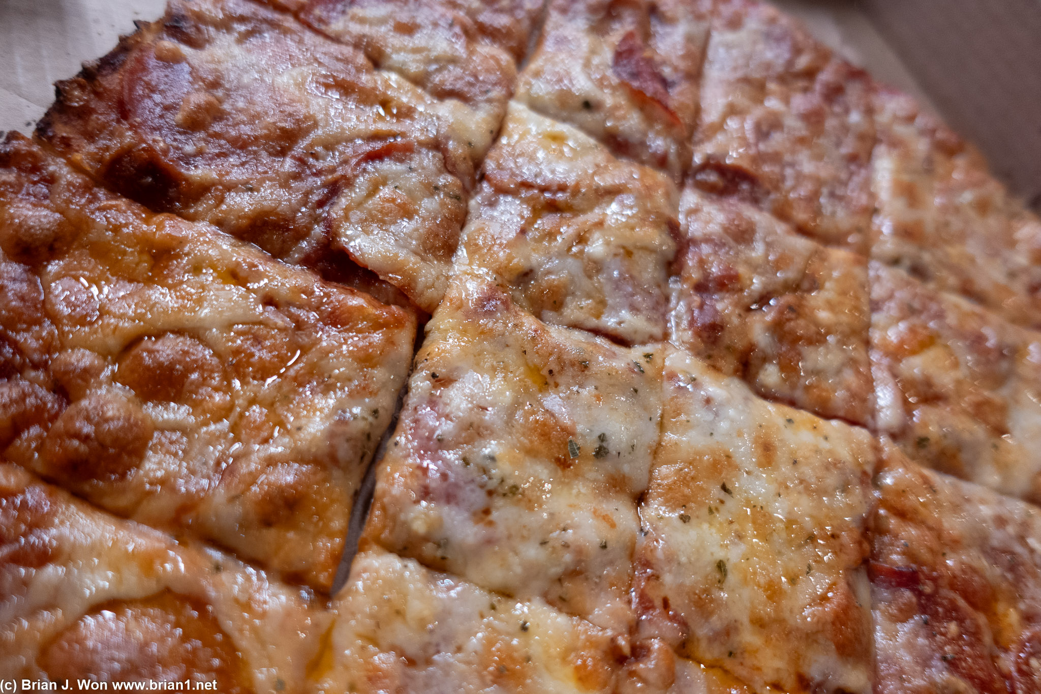 St. Louis-style pizza is super thin, covered in cheap cheese.