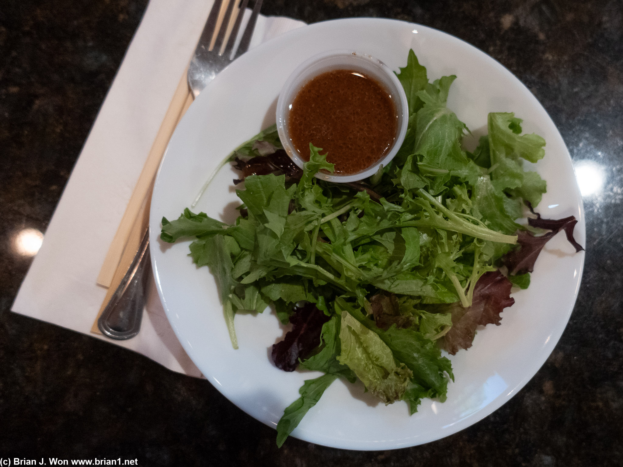 Salad at Mizu Sushi. Just mixed greens and ginger dressing.