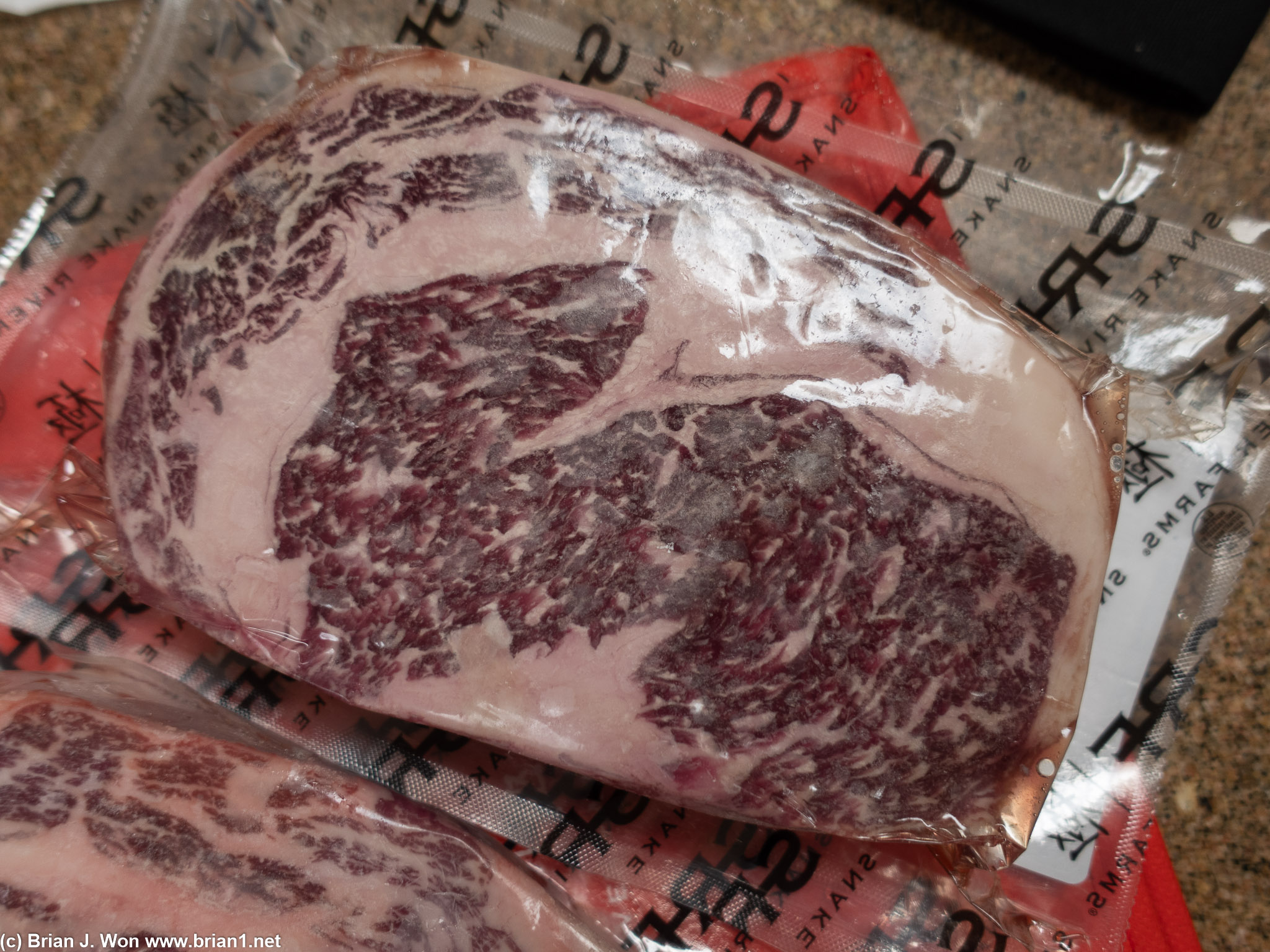 Snake River Farms Gold Grade 1.5" thick ribeyes.